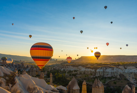 Hot Air Balloons Over Love Valley in Cappadocia, Turkey at Dawn.の写真素材