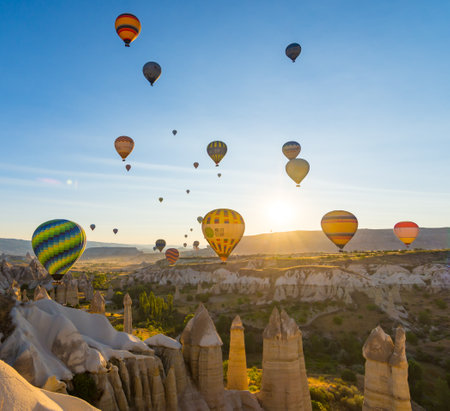 Hot Air Balloons Over Love Valley in Cappadocia, Turkey at Dawn.の写真素材