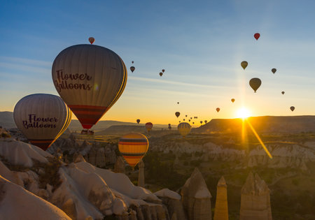 Hot Air Balloons Over Love Valley in Cappadocia, Turkey at Dawn.の写真素材