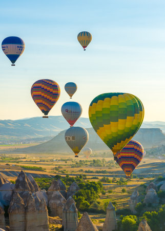 Hot Air Balloons Over Love Valley in Cappadocia, Turkey at Dawn.の写真素材