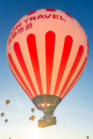 Hot Air Balloons Over Love Valley in Cappadocia, Turkey at Dawn.の写真素材