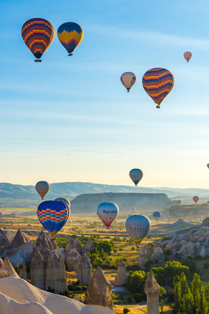 Hot Air Balloons Over Love Valley in Cappadocia, Turkey at Dawn.の写真素材
