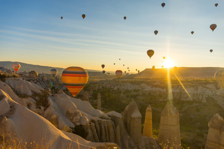 Hot Air Balloons Over Love Valley in Cappadocia, Turkey at Dawn.の写真素材