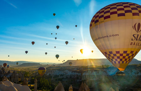 Hot Air Balloons Over Love Valley in Cappadocia, Turkey at Dawn.の写真素材