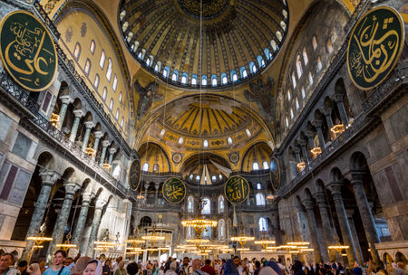 Hagia Sophia's Dome Interior and Nave with Christian Icons and Islamic Medallions  in Istanbul, Turkey.のeditorial素材