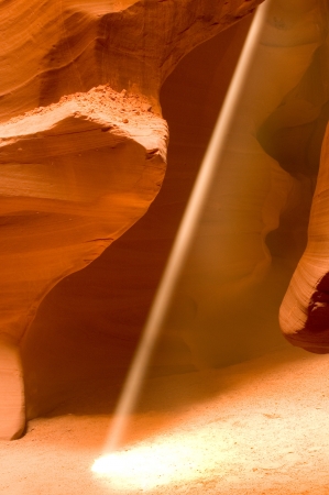 A beam of sunlight shining into Antelope Canyonの写真素材