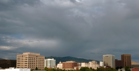 Dark cloudy skys over the Boise, Idaho City skylineの写真素材