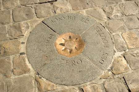 Point zero des routes de France is the zero point of France and has existed for several centuries.  It is where distances are calculated between Paris and other French or foreign cities. The monument is a simple bronze milestone, sealed in a stone of the の写真素材