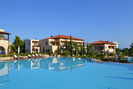 Kassandra, Halkidiki, Greece - September, 20 2013: Blue swimming pool in luxury Greek hotel Aegean Melathron Thalasso, Halkidiki, Greece.のeditorial素材