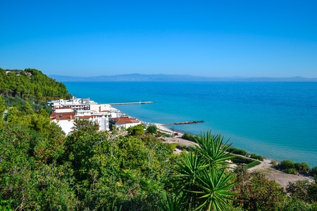 Seaview. Mountains covered with green plants and pensions. Greece. Kassandra. Halkidiki