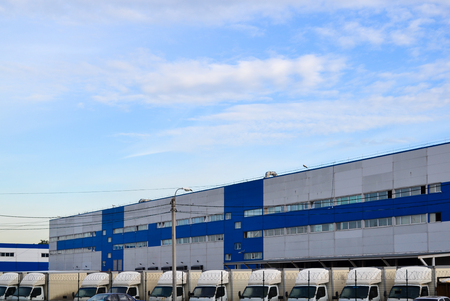 Large distribution warehouse and a lot of machines for delivery of goodsの写真素材