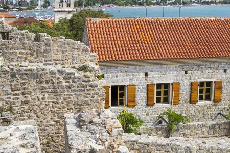 Landscape of Old town Budva: Ancient walls and red tiled roof. Montenegro, Europe.の写真素材