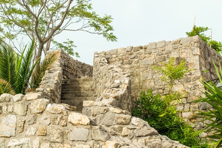 The walls of the castle with a stone staircase from inside the fortressの写真素材