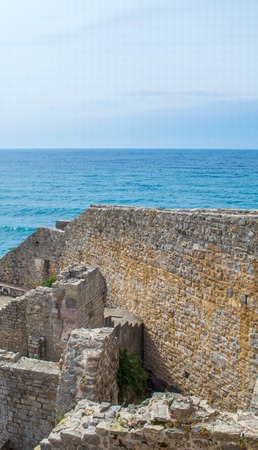 The walls of the castle with a stone staircase from inside the fortressの写真素材