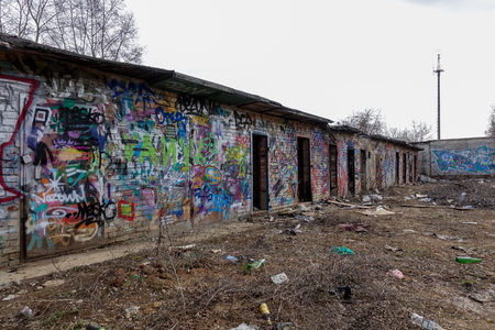 Destroyed brick buildings painted with graffiti. Russian favella. Moscow region.の写真素材