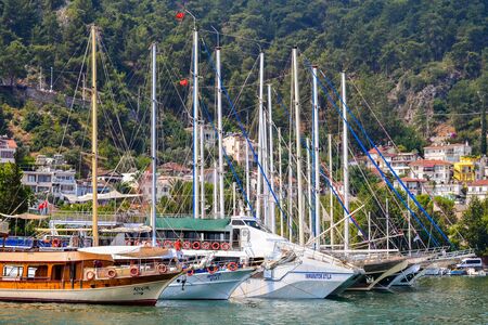June 17, 2019 Fethiye, Turkey - Marine sailing ships parked in Fethiye Bay, Turkey.のeditorial素材