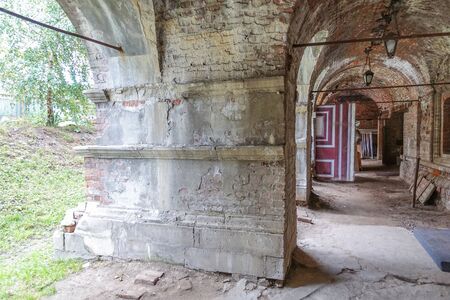 Antique collapsing interior with arches and arches
