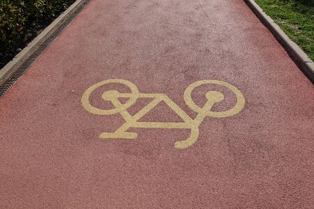 Bicycle shine highlighted in red and with a signの写真素材