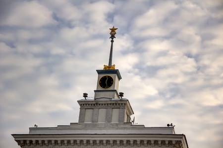 old town clock against cloudly skyのeditorial素材