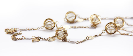 golden necklace isolated on the white backgroundの写真素材