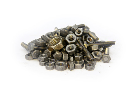 Bolts and nuts closeup on a white background.