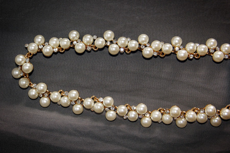 Elegance Necklace Isolated on Gray Texture.の写真素材