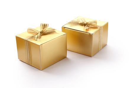 Golden Gift Boxes are on White Background.の写真素材