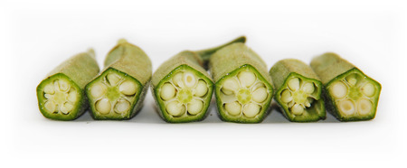 Fresh raw okra isolated on white backgroundの写真素材