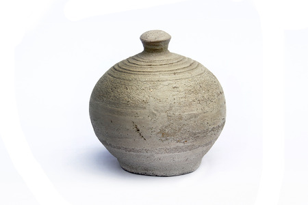 Vintage Pottery isolated over a white background.の写真素材