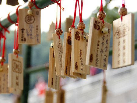 Wishing wooden tag hanging in Chinese temple. Shanghai.