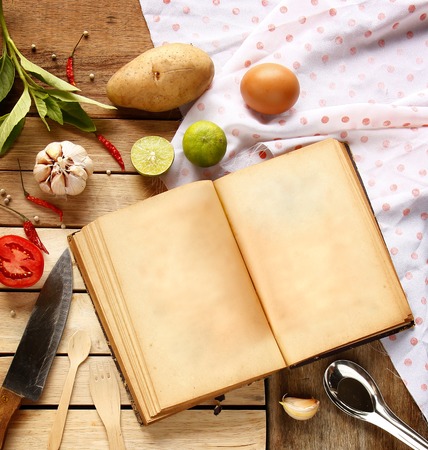 Fresh ingredients for cooking are on wooden background with copy spaceの写真素材