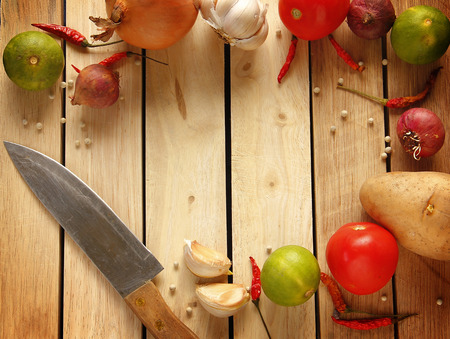 Fresh ingredients for cooking are on wooden background with copy spaceの写真素材