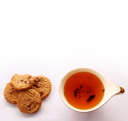 Chocolate Cookies and tea are on White Background.の写真素材
