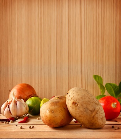 Fresh ingredients for cooking are on wooden background with copy spaceの写真素材