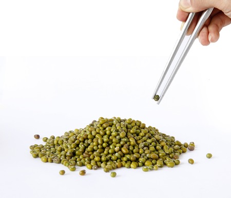 green beens are on white  background.