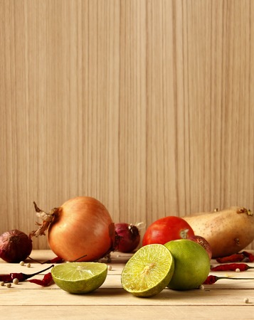 Fresh ingredients for cooking are on wooden background with copy spaceの写真素材
