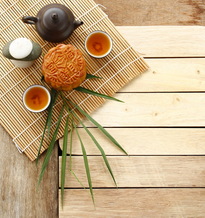 Mooncake Mid-Autumn Festival for Dessert Concept. Appreciate the full moon and various cultural activities significantly. The Celebration of Chinese Heritage.の写真素材