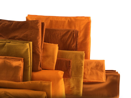 The Yellow robe in many Earth tones for the monk. The yellow fabric of a Buddhist Monk or A Buddhist Novice. Texture and Background Concept.の写真素材