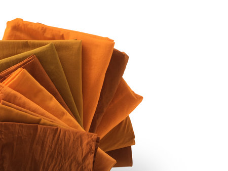 The Yellow robe in many Earth tones for the monk. The yellow fabric of a Buddhist Monk or A Buddhist Novice. Texture and Background Concept.の写真素材