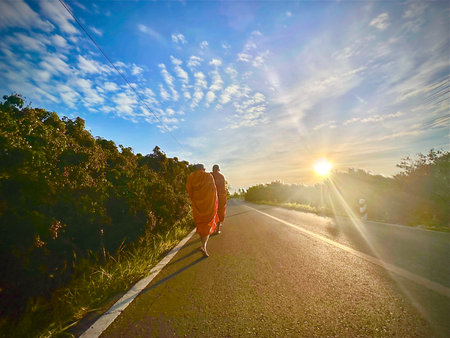 Lamphun Province, Thailand,  02 January 2026 :The  group of Thai monks are walking straight in a...
