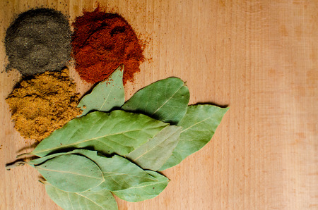 Bay leaves, pepper, nutmeg and paprika.の写真素材