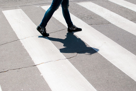 Man enters the crosswalk on the road. Traffic rulesの写真素材