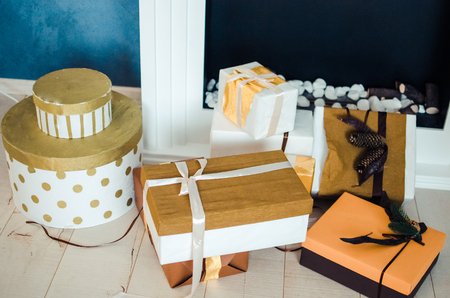 Christmas gifts in gold colorの写真素材