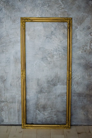 Frame on a background of gray wallの写真素材
