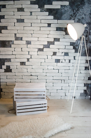 Room with a white brick wall, skin, lampの写真素材