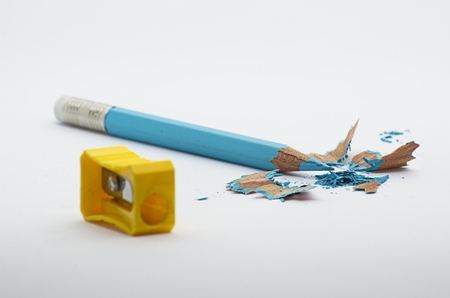 Closeup photo to an used sketching blue pencilの写真素材
