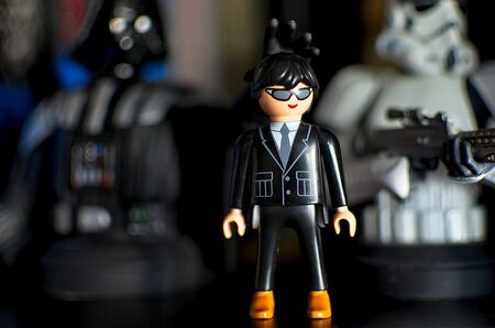 PONTEVEDRA, SPAIN - SEPTEMBER 01, 2019: Playmovil cool man figurine on a book shelfのeditorial素材