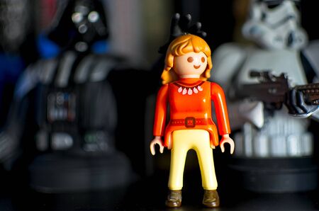 PONTEVEDRA, SPAIN - SEPTEMBER 01, 2019: Playmovil cool woman figurine on a book shelf