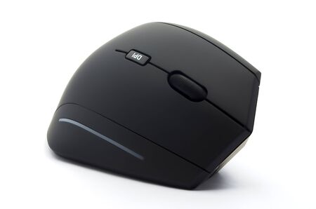 Ergonomic black mouse three quarters view on white backgroundの写真素材