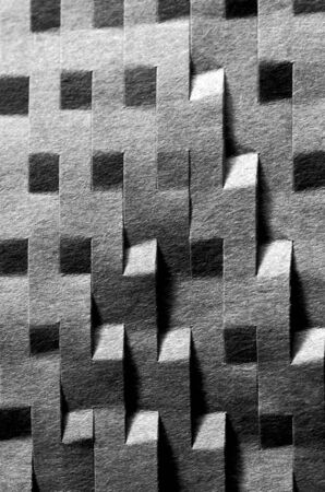 Microcut cardboard sheet. Macro photography in black and white. Cardboard textureの写真素材